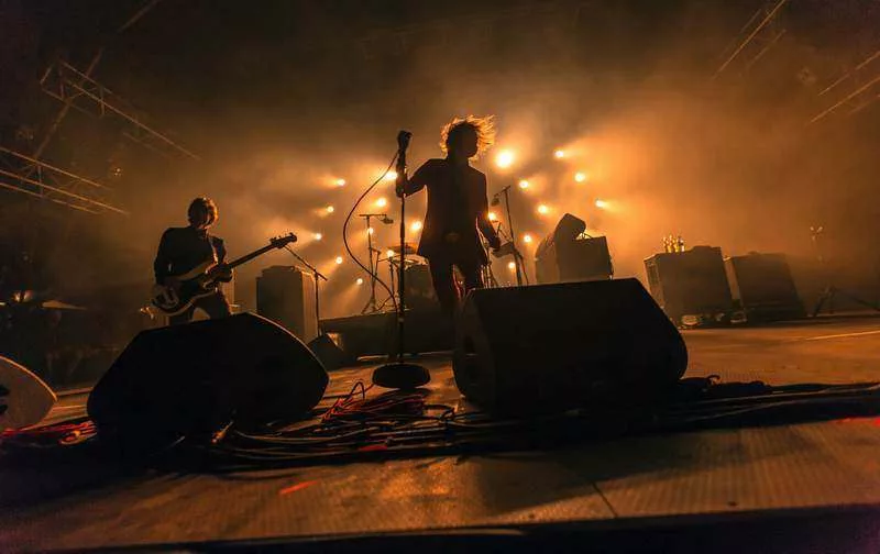 Photographe professionnel : guide 2026, secrets d’un pro rock
